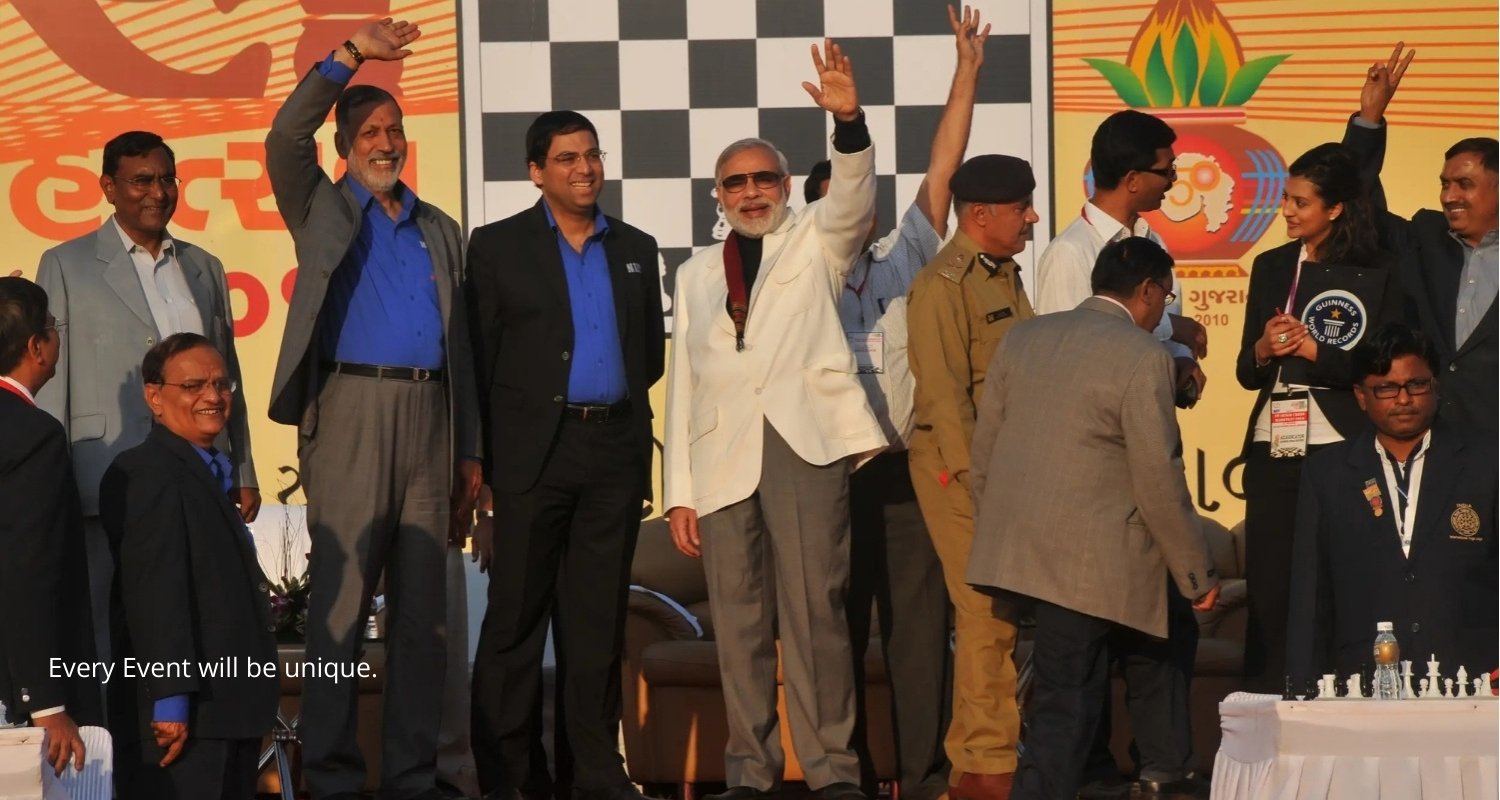 Elegant wedding setup with floral decorations and seating, white chairs and pastel flowers on tables, soft natural lighting, different angle